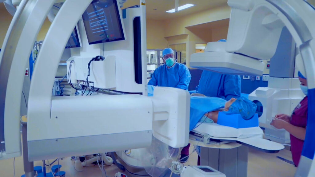 Cardiology procedure at UMC using advanced imaging equipment to monitor heart rhythm.